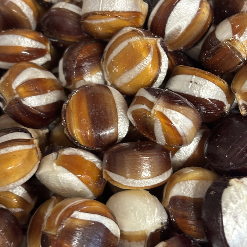 Brown and white striped round, boiled lollies