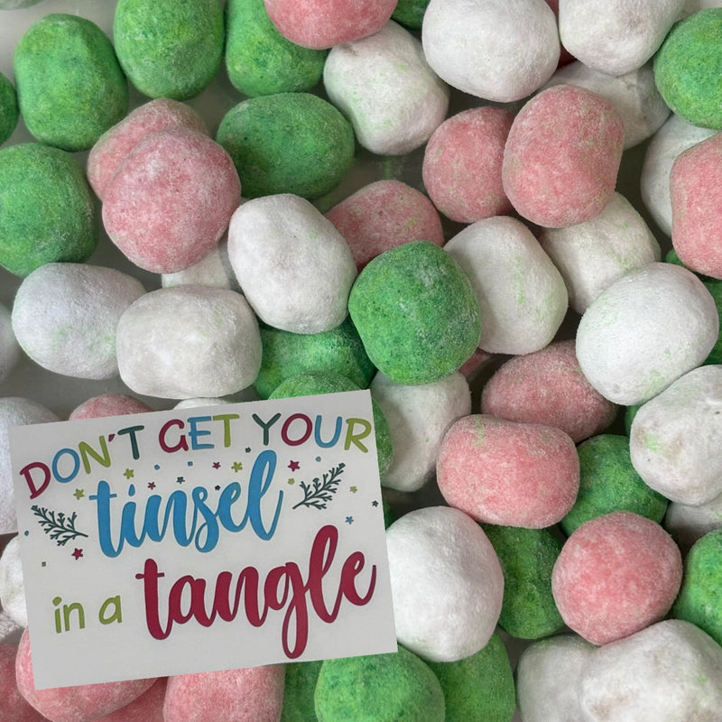 Don't Get Your Tinsel in a Tangle sign with assorted colour English bon bons. 