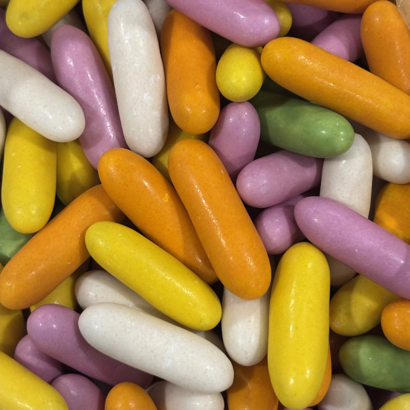 Licorice sticks coated in a colourful candy coating