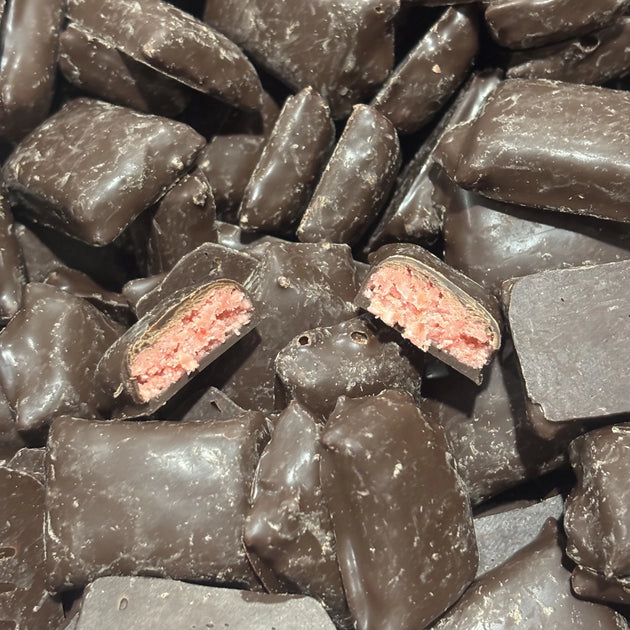 Chocolate bites with a coconut and cherry filling