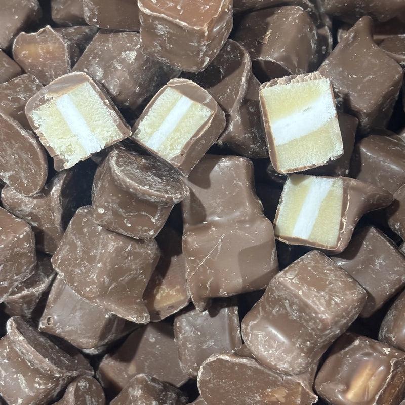 Caramel coloured squares with a creamy white stripe through the centre and coated in milk chocolate.