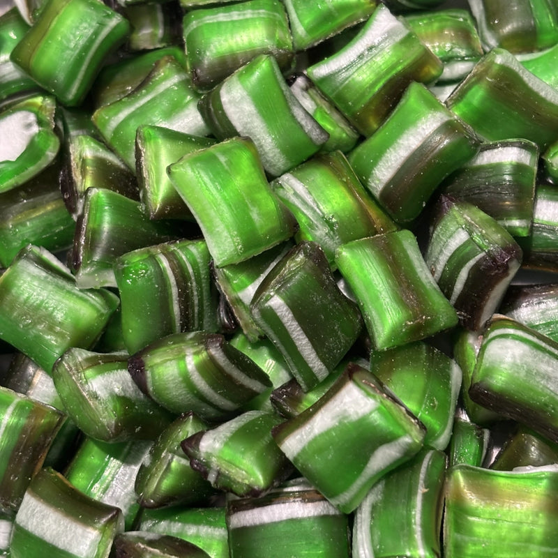 Green and white striped peppermint shell rock candy with a delicious chocolate centre