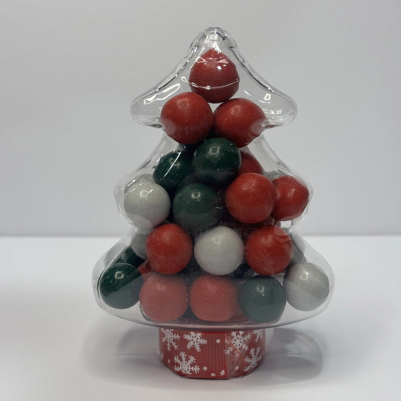 Clear Christmas tree-shaped container filled with red, green and white candy-coated peppermint chocolate balls and Jaffas.