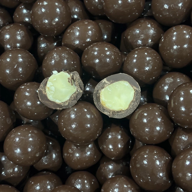 Macadamia nuts coated in dark chocolate