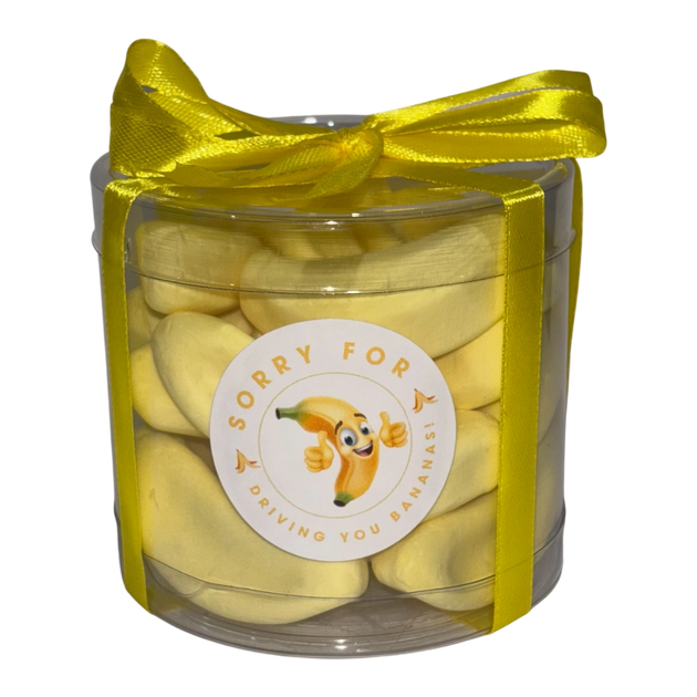 Banana lollies in a container with a label - sorry for driving you bananas