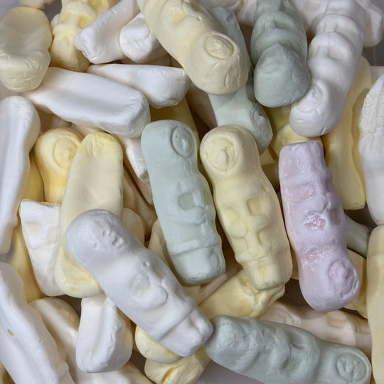 Green, white, pink and yellow eskimo shaped lollies