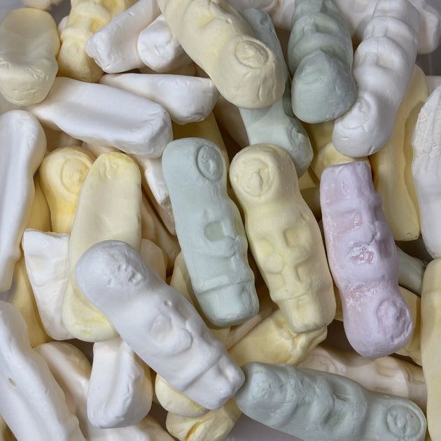 Green, white, pink and yellow eskimo shaped lollies