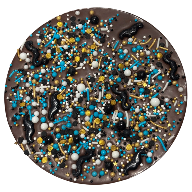 Milk chocolate freckle coated in assorted coloured sprinkles and moustaches