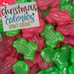 Christmas Calories Don't Count sign with red and green frog lollies