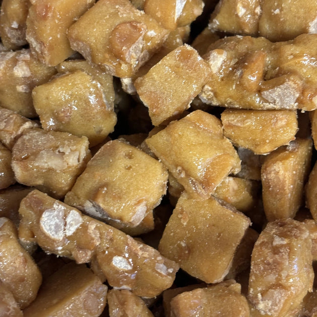 Macadamia nuts coated in caramelised toffee