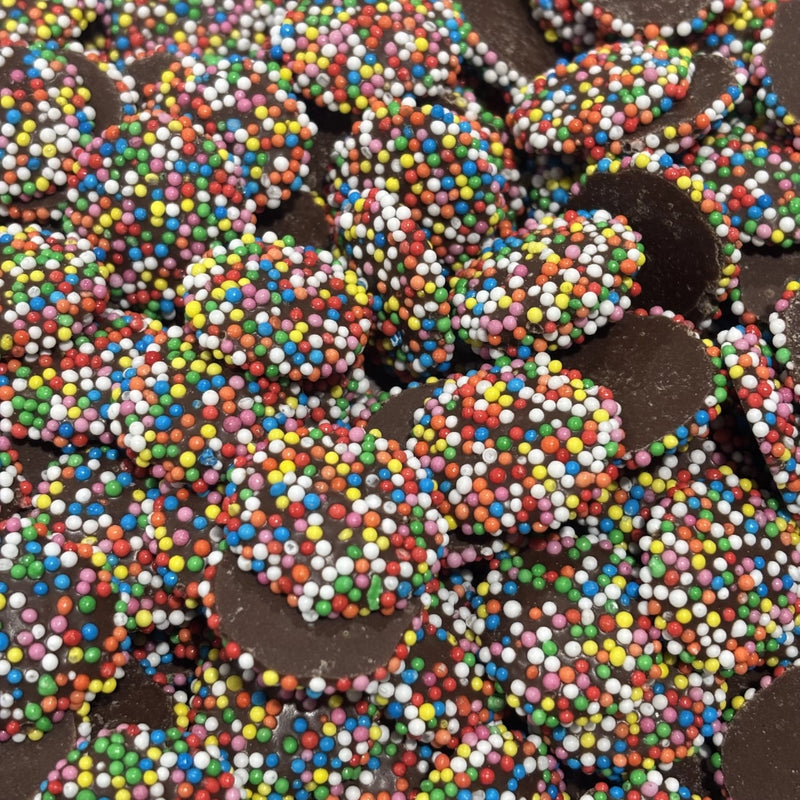 Round chocolate pieces topped with sprinkles