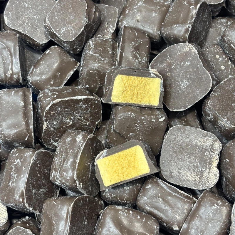 Squares of honeycomb coated in milk chocolate