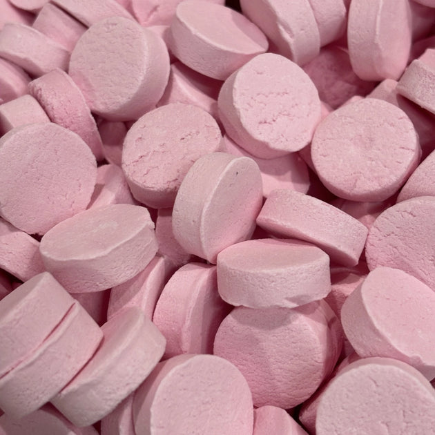 Round pink musk button lollies