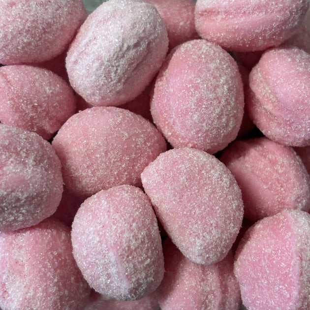 Pink crumbly lollies with a musk flavour