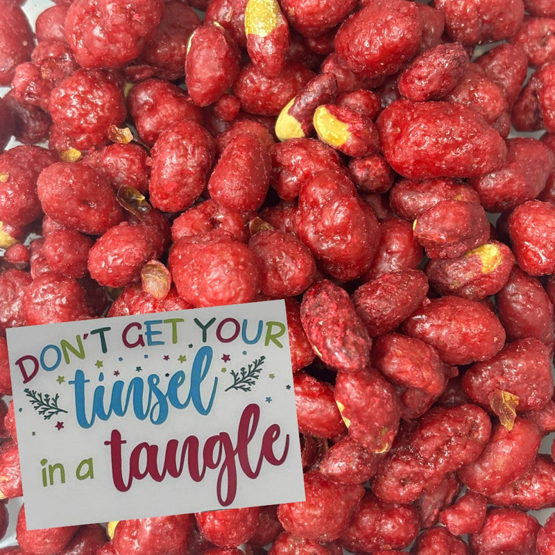 Don't Get Your Tinsel in a Tangle sign with red sugared peanuts