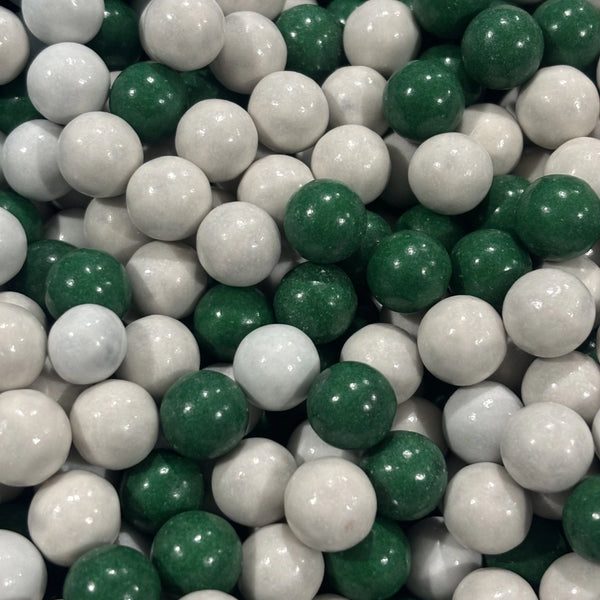 Chocolate peppermint balls with a white or green candy shell