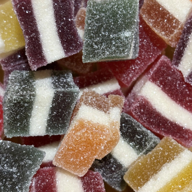 Chewy fruit-flavoured jellies, layered with a creamy white centre and finished with a light sugar coating.