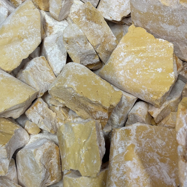 Raw honeycomb with golden honey in natural beeswax cells