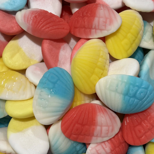 Assorted colour sea shell lollies with DAMEL stamped on them