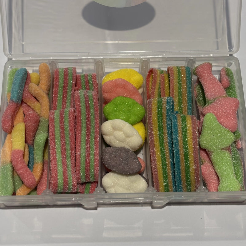 Assorted sour lollies in a snack box