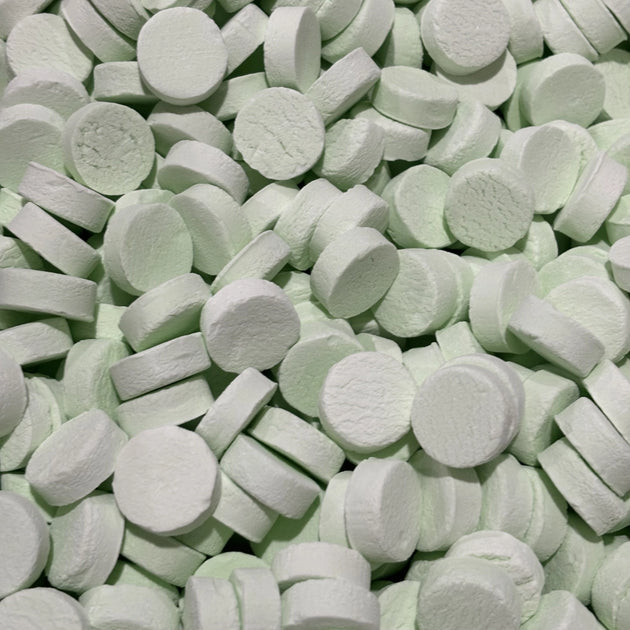 Round green spearmint flavour hard lollies