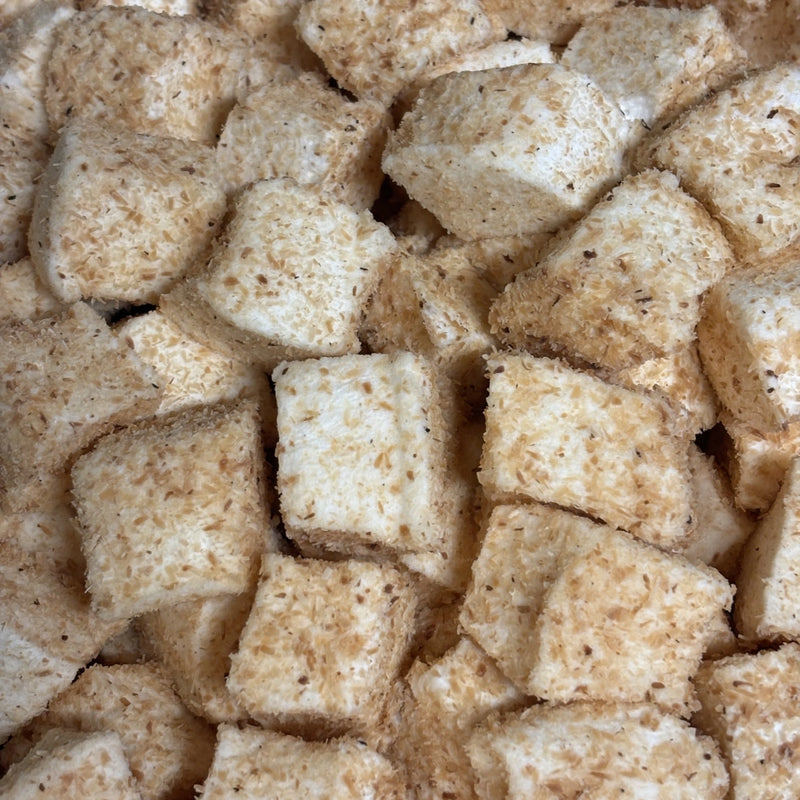 Marshmallow squares coated in toasted coconut